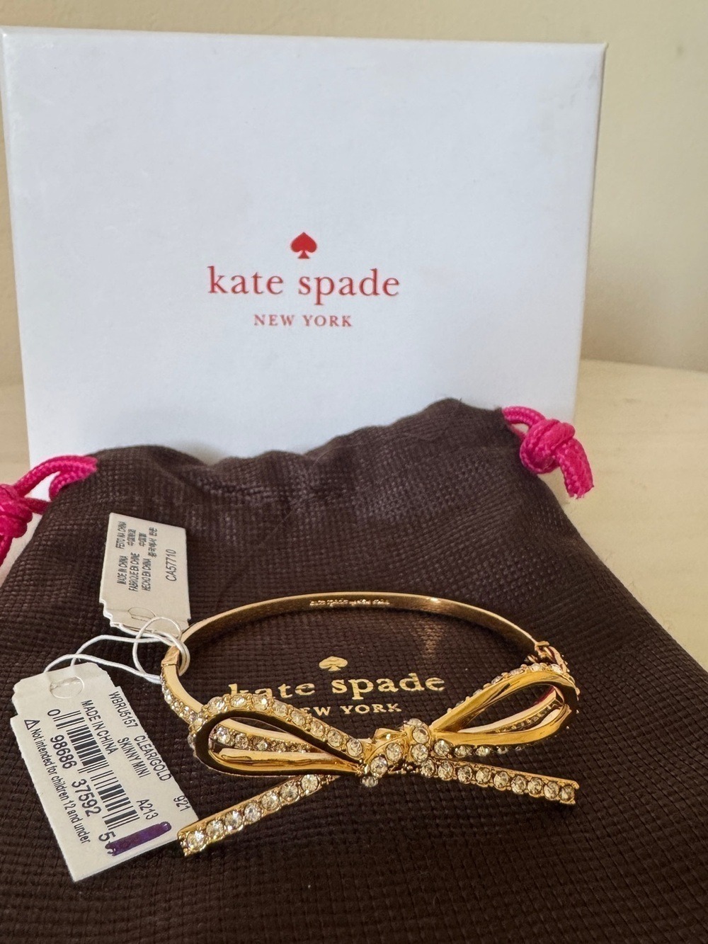 NEW Kate Spade Skinny Mini Gold-tone Crystal Bow Bangle